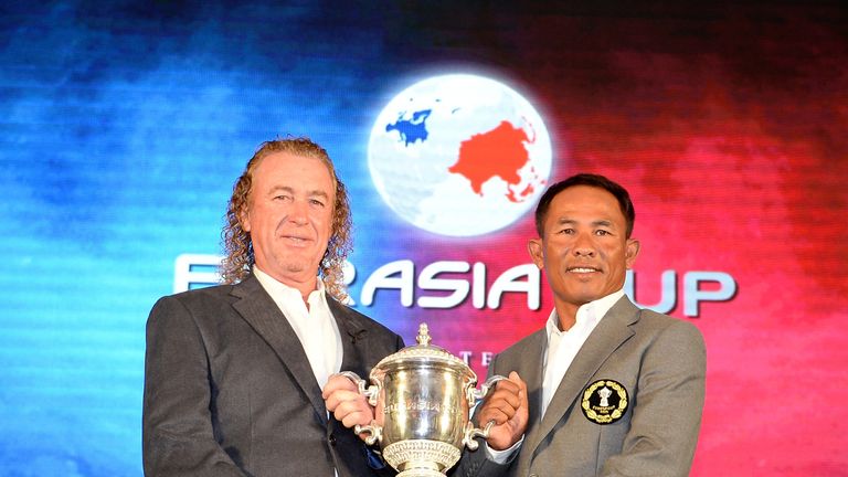 Miguel Angel Jimenez and Thongchai Jaidee with the EurAsia Cup trophy
