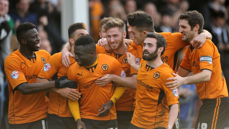 Wolverhampton Wanderers' Nouha Dicko (centre) celebrates scoring his second goal against Walsall