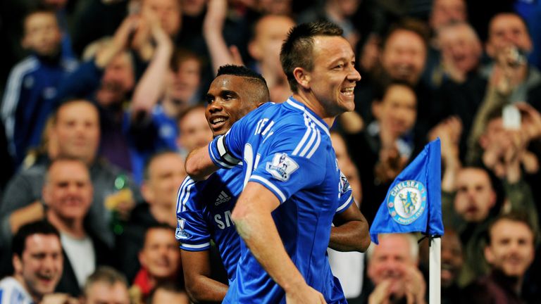 LONDON, ENGLAND - MARCH 08:  Samuel Eto'o of Chelsea is congratulated by teammate John Terry after scoring his team's first goal during the Barclays Premie