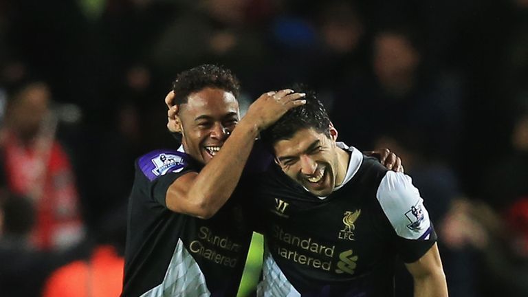 SOUTHAMPTON, ENGLAND - MARCH 01: Raheem Sterling (L) of Liverpool celebrates his goal with Luis Suarez during the Barclays Premier League match between Sou