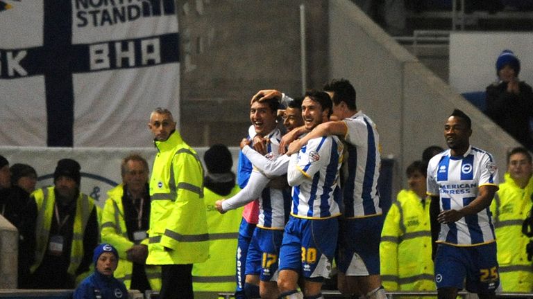 Stephen Ward of Brighton & Hove Albion (17) celebrates with team-mates after scoring their second goal