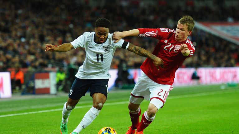  Raheem Sterling of England takes on Jesper Juelsgard of Denmark during the International Friendly match between England and Denmark.
