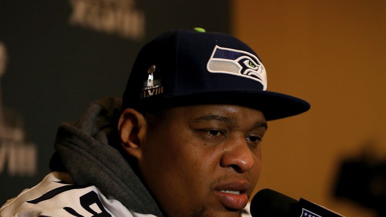 Red Bryant of the Seattle Seahawks addresses the media during Super Bowl XLVIII media availability