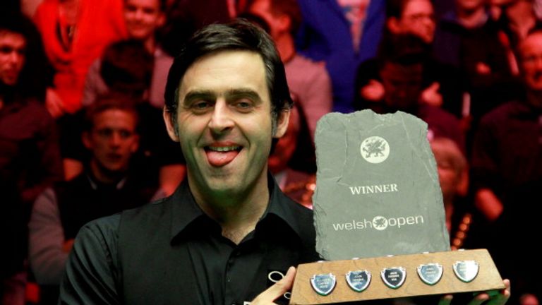 NEWPORT, WALES - MARCH 02:  (CHINA OUT) Ronnie O'Sullivan of England celebrates with trophy after winning the final match against Ding Junhui of China in T