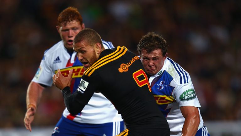 Tawera Kerr-Barlow of the Chiefs is tackled  during the round five Super Rugby match between the Chiefs and the Stormers