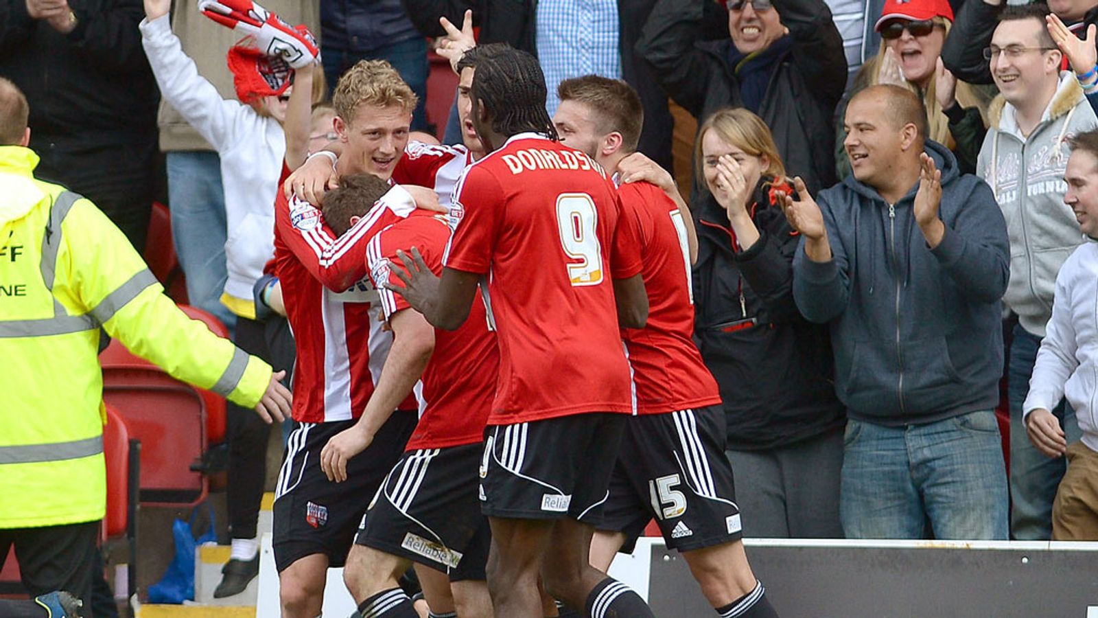 League One: Brentford promoted after beating Preston and Wolves' win