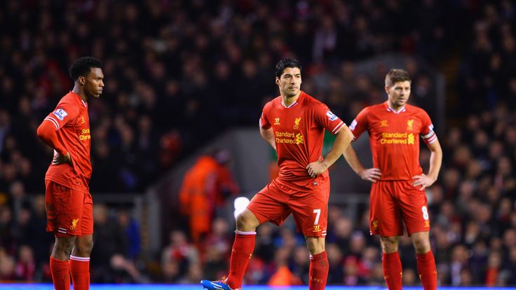 Luis Suarez (C) of Liverpool with Daniel Sturridge (L) and Steven Gerrard.