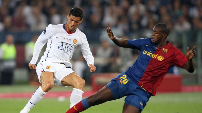 Cristiano Ronaldo of Manchester United clashes with Yaya Toure of Barcelona during the UEFA Champions League Final in 2009.