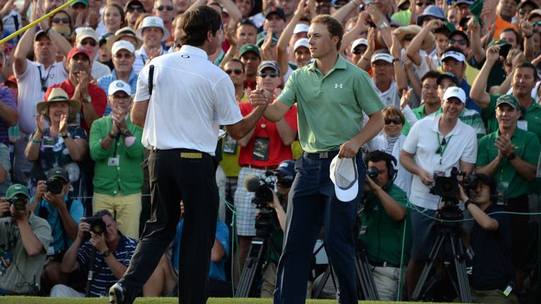 Bubba Watson and Jordan Spieth (r) shake hands following Sunday's final round
