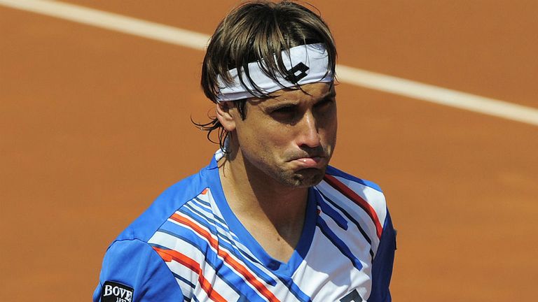 - Spanish tennis player David Ferrer grimaces during play against Russian tennis player Teymuraz Gabashvili at the Barcelona Open tennis tournament Conde de Godo in Barcelona