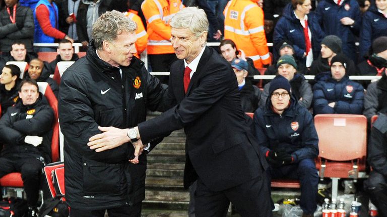 Arsenal boss Arsene Wenger (r) with former Manchester United manager David Moyes