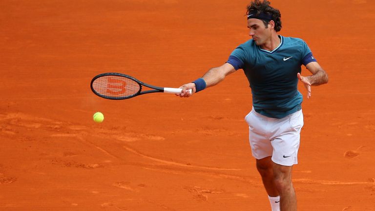 - Roger Federer of Switzerland in action against Jo-Wilfried Tsonga of France during day six of the ATP Monte Carlo Rolex Masters Tennis at Monte-Carlo