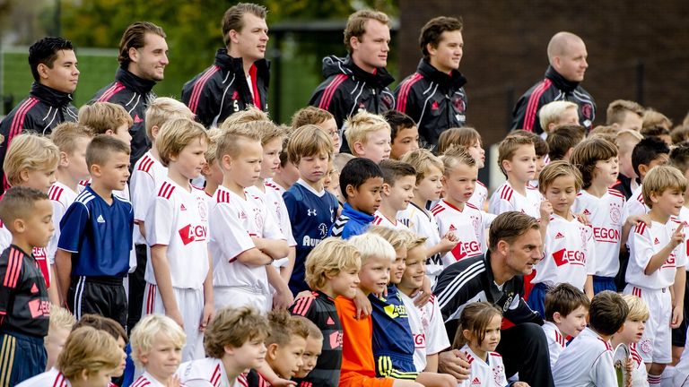 Children take part in a football training at the Ajax clinic in the youth complex The Future in Amsterdam.