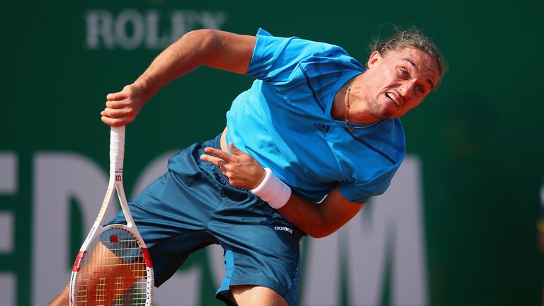 Alexandr Dolgopolov of Ukraine serves in his match against Ernests Gulbis of Latvia during day one of the ATP Monte Carlo 