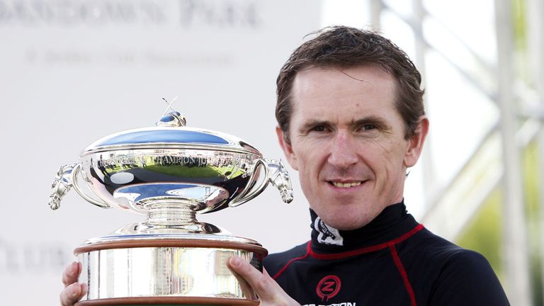 Tony McCoy is presented with the Champion Jockey's trophy during the Bet365 Jump Finale at Sandown Park, Sandown. PRESS ASSOCIATION Photo. Picture date: Sa