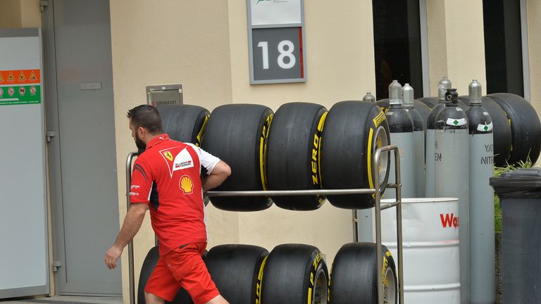 Ferrari mechanic with Pirelli tyres
