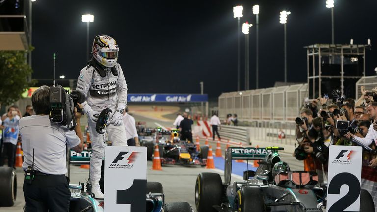 Lewis Hamilton celebrates in parc ferme