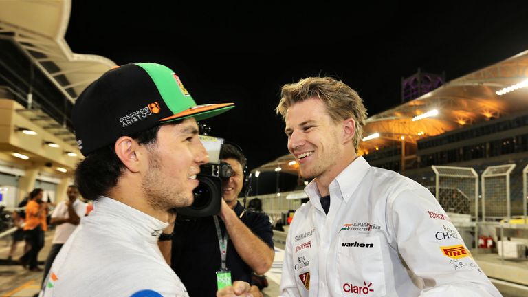Sergio Perez is congratulated by Nico Hulkenberg
