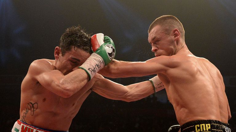 Anthony Crolla (left) and John Murray during the WBO Inter-Continental Lightweight Title bout at the Phones 4U Arena, Manchester.