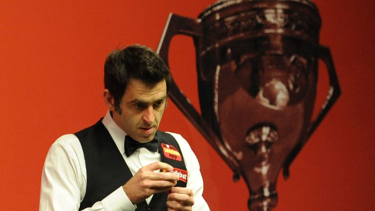 Ronnie O'Sullivan at the table in his first round match against Robin Hull during the World Snooker Championship at The Crucible