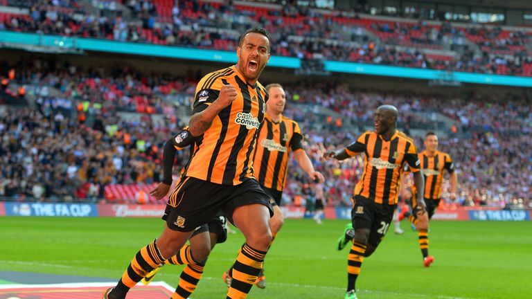 LONDON, ENGLAND - APRIL 13:  Tom Huddlestone of Hull City celebrates scoring their third goal during the FA Cup with Budweiser semi-final match between Hul