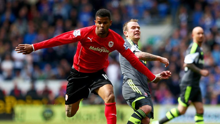 CARDIFF, WALES - APRIL 19:  Fraizer Campbell of Cardiff City evades Glenn Whelan of Stoke City during the Barclays Premier League match
