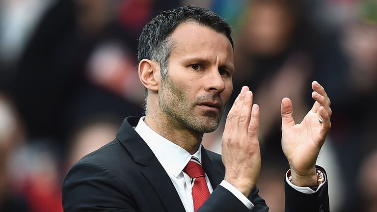 MANCHESTER, ENGLAND - APRIL 26:  Ryan Giggs of Manchester United applauds the fans after a rousing victory in his first match as manager during the Barclay