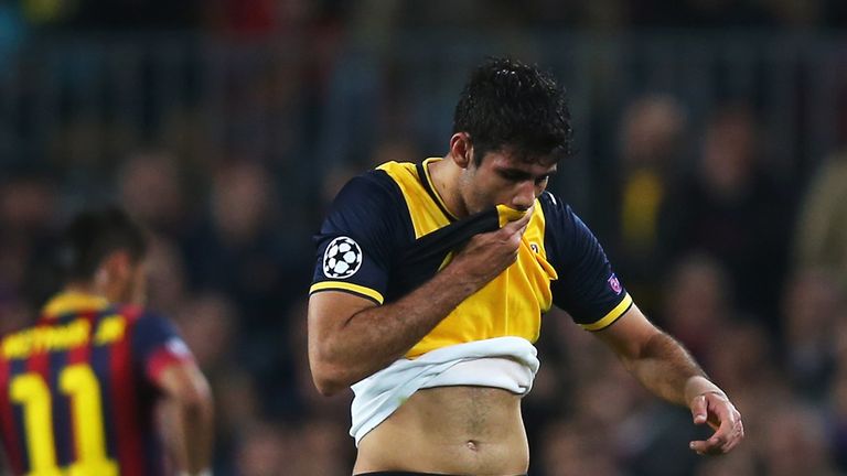Diego Costa of Club Atletico de Madrid leaves the field injured