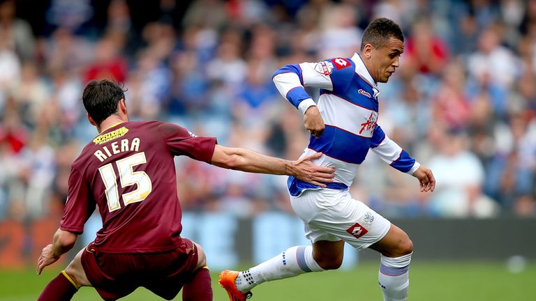 LONDON, ENGLAND - APRIL 21: Ravel Morrison of Queens Park Rangers is challenged by Albert Riera of Watford during the Sky Bet Championship match