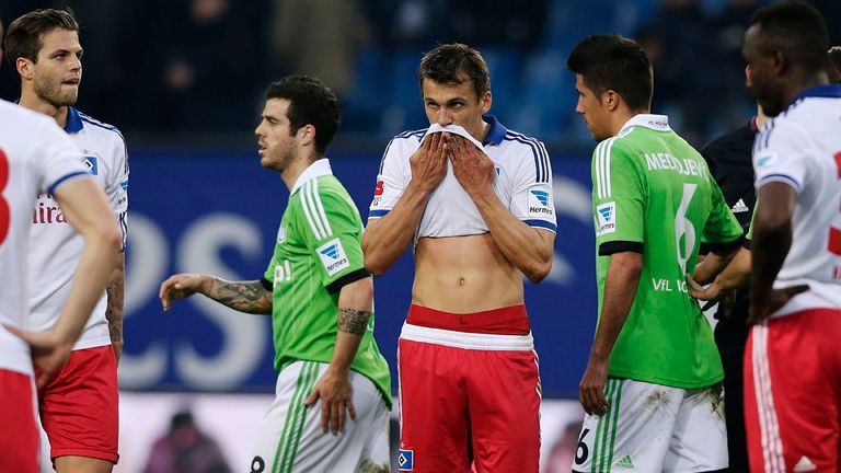 Ivo Ilicevic (C) of Hamburg appears frustrated after the Bundesliga match between Hamburger SV and VfL Wolfsburg at Imtech Arena