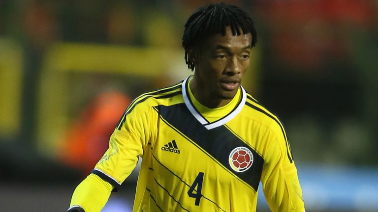 Juan Cuadrado of Colombia runs with the ball during the international friendly match between Belgium and Colombia
