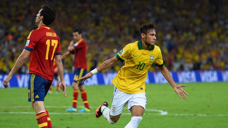 Neymar of Brazil celebrates as he scores their second goal during the FIFA Confederations Cup Brazil 2013 Final match be