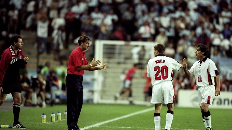 30 Jun 1998: Michael Owen and Gary Neville of England receive instructions from coach Glenn Hoddle during the World Cup 2nd round match against Argentina