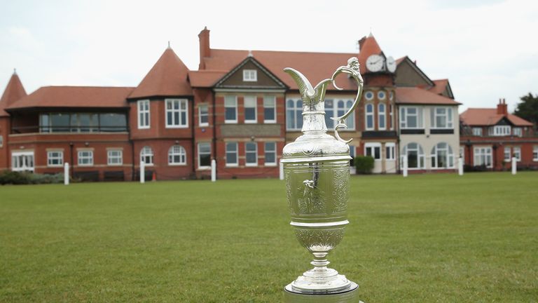 HOYLAKE, ENGLAND - APRIL 23:  The Open Championship trophy (also known as the claret jug) is pictured in front of the clubhouse during The Open Championshi