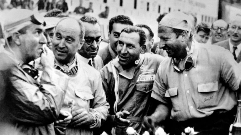 Juan Manuel Fangio chats to Giuseppe Farina after winning the 1950 Belgian Grand Prix