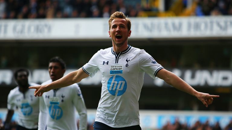 Harry Kane of Tottenham Hotspur celebrates scoring their second goal against Fulham