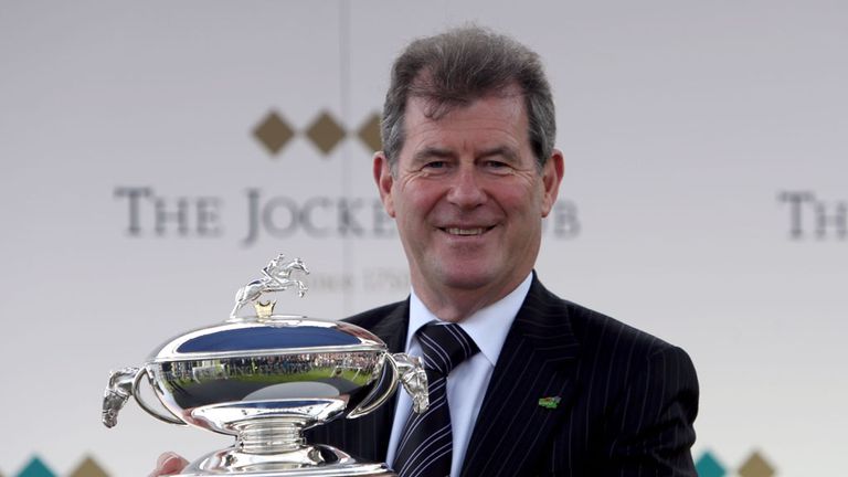 J. P. McManus is presented with the champion owner trophy during the Bet365 Jump Finale at Sandown Park, Sandown. PRESS ASSOCIATION Photo. Picture date: Sa