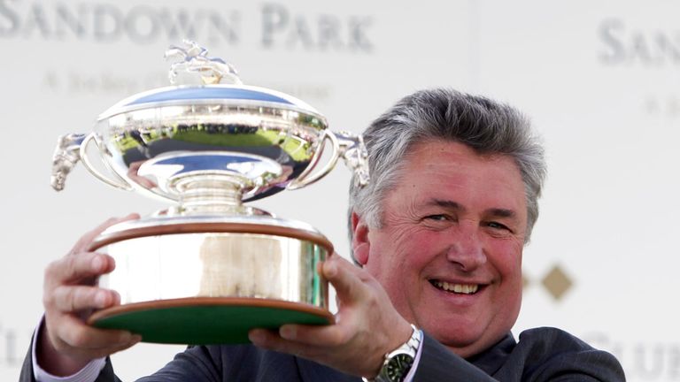Paul Nicholls is presented the champion trainers trophy during the Bet365 Jump Finale at Sandown Park, Sandown. PRESS ASSOCIATION Photo. Picture date: Satu
