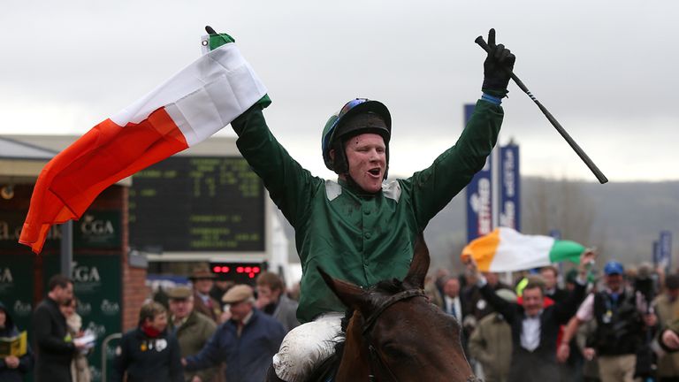 Jockey Colman Sweeney celebrates winning the CGA Foxhunter Chase Challenge Cup on Salsify during Cheltenham Gold Cup Day, at the Cheltenham Festival.
