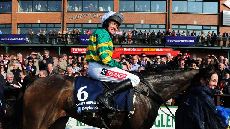 Jockey Barry Geraghty after riding Shutthefrontdoor to victory in the Boylesports Irish Grand National Steeplechase during Irish Grand National Day at Fair