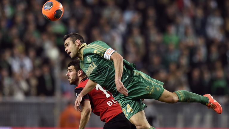 Saint-Etienne's French defender Loic Perrin (R) challenges Rennes' French midfielder Vincent Pajot during the French L1 