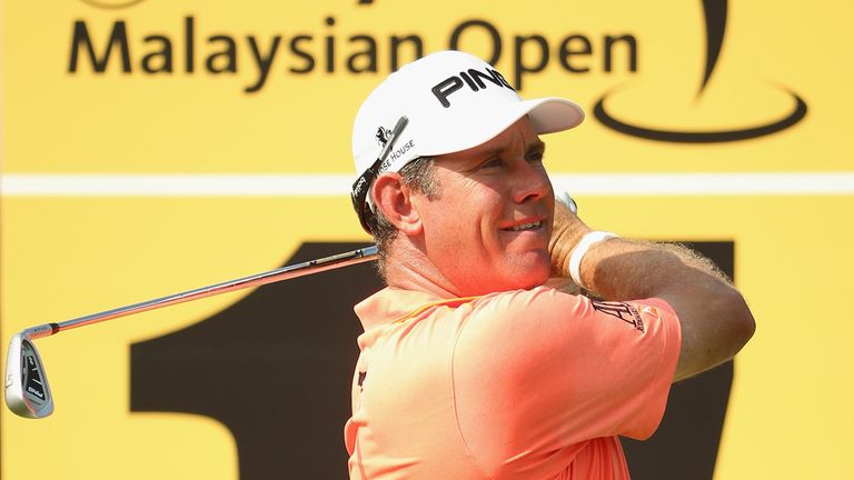 Lee Westwood of England in action during round one of the 2014  Maybank Malaysian Open