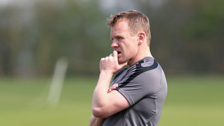 Mark McCall, the Saracens director of rugby looks on during a training session