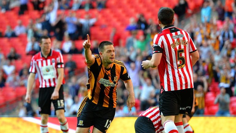 Matthew Fryatt of Hull City turns to the celebrate after scoring their second goal during the FA Cup with Budweiser semi-final against Sheffield United