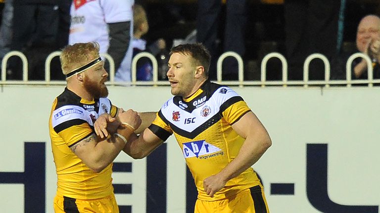 Castleford Tigers Michael Shenton (centre) is congratulated on scoring his team's second try against St Helens