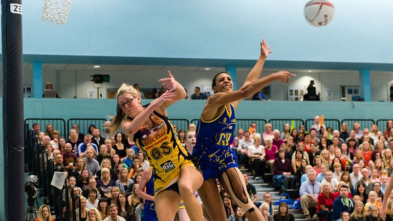 Manchester Thunder's Krista Enziano battles Team Bath's Stacey Francis for the ball.