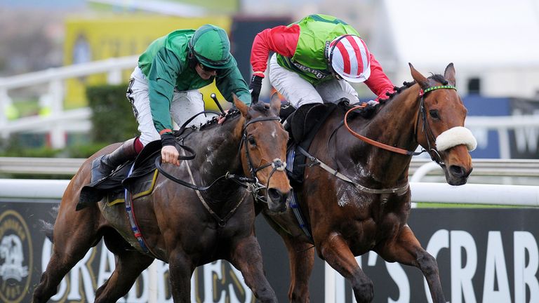 Ballybolley ridden by Sam Twiston-Davies (left) wins the Weatherbys Private Banking Champion Standard Open National Hunt Flat Race