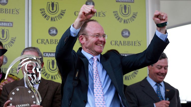 Trainer Dr Richard Newland celebrates his victory with Pineau De Re in the Grand National