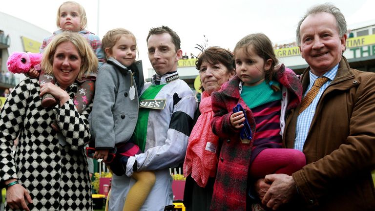 Leighton Aspell celebrates with his family after Pineau De Re won The Crabbie's Grand National
