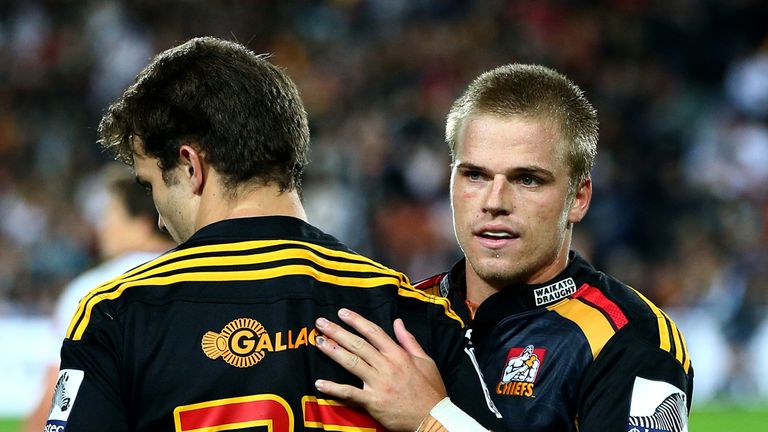 HAMILTON, NEW ZEALAND - APRIL 12:  Gareth Anscombe of the Chiefs hugs Jordan Payne at the end of the game during the round nine Super Rugby match between t